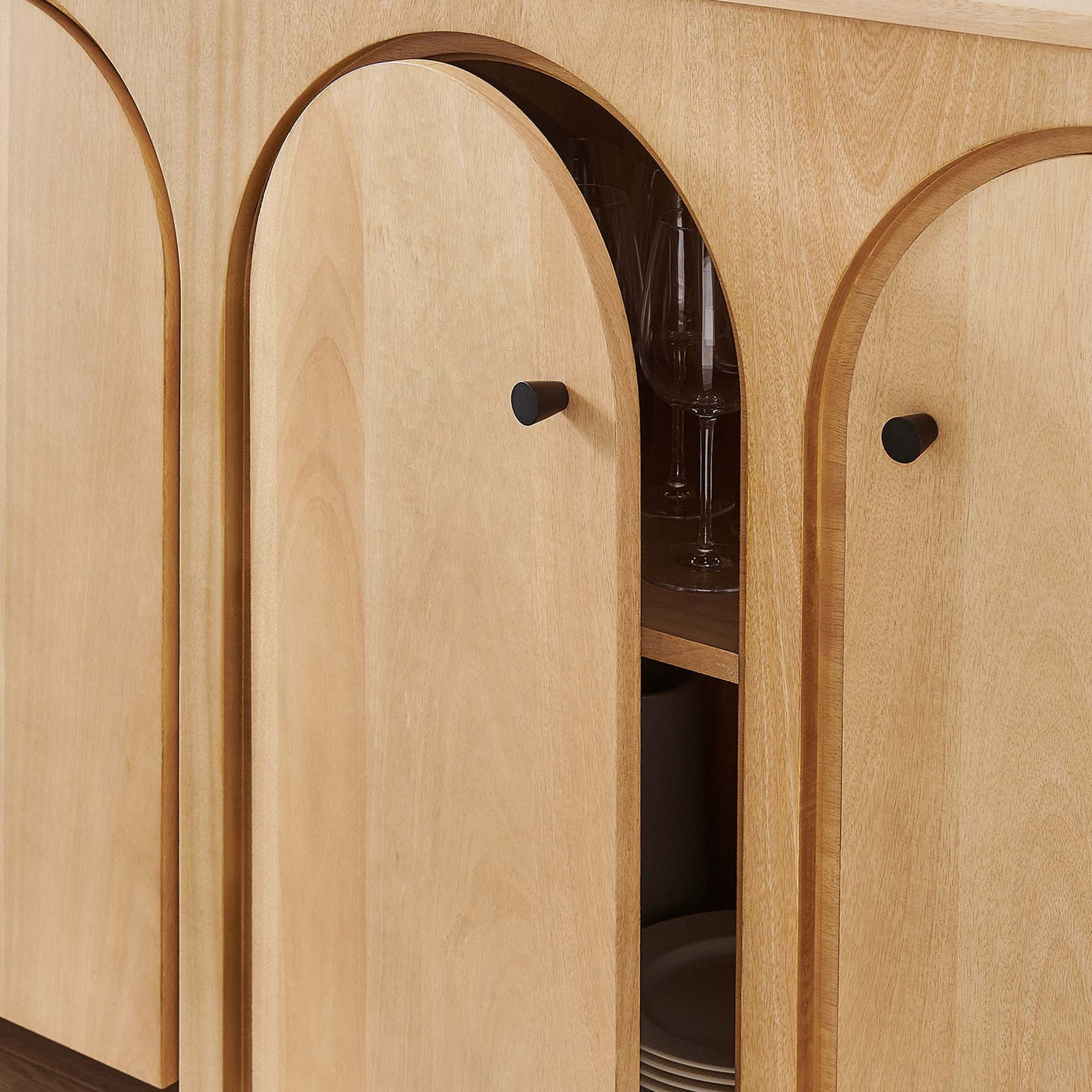 Cabinet door opens to reveal dinnerware and glassware storage, keeping entertaining essentials close at hand || EEI-6538-OAK || storage_open_room