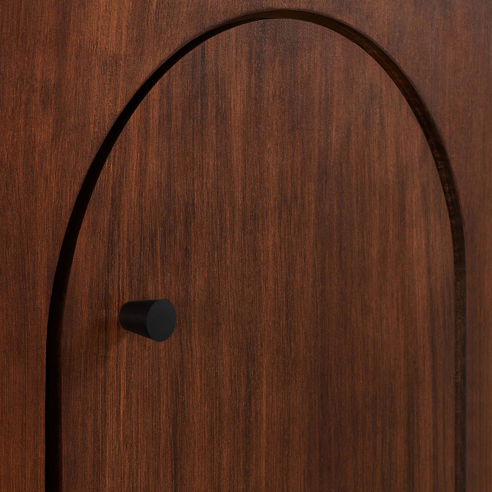 Arched walnut door with minimalist black knob and smooth wood grain texture || EEI-6538-WAL || handle_studio