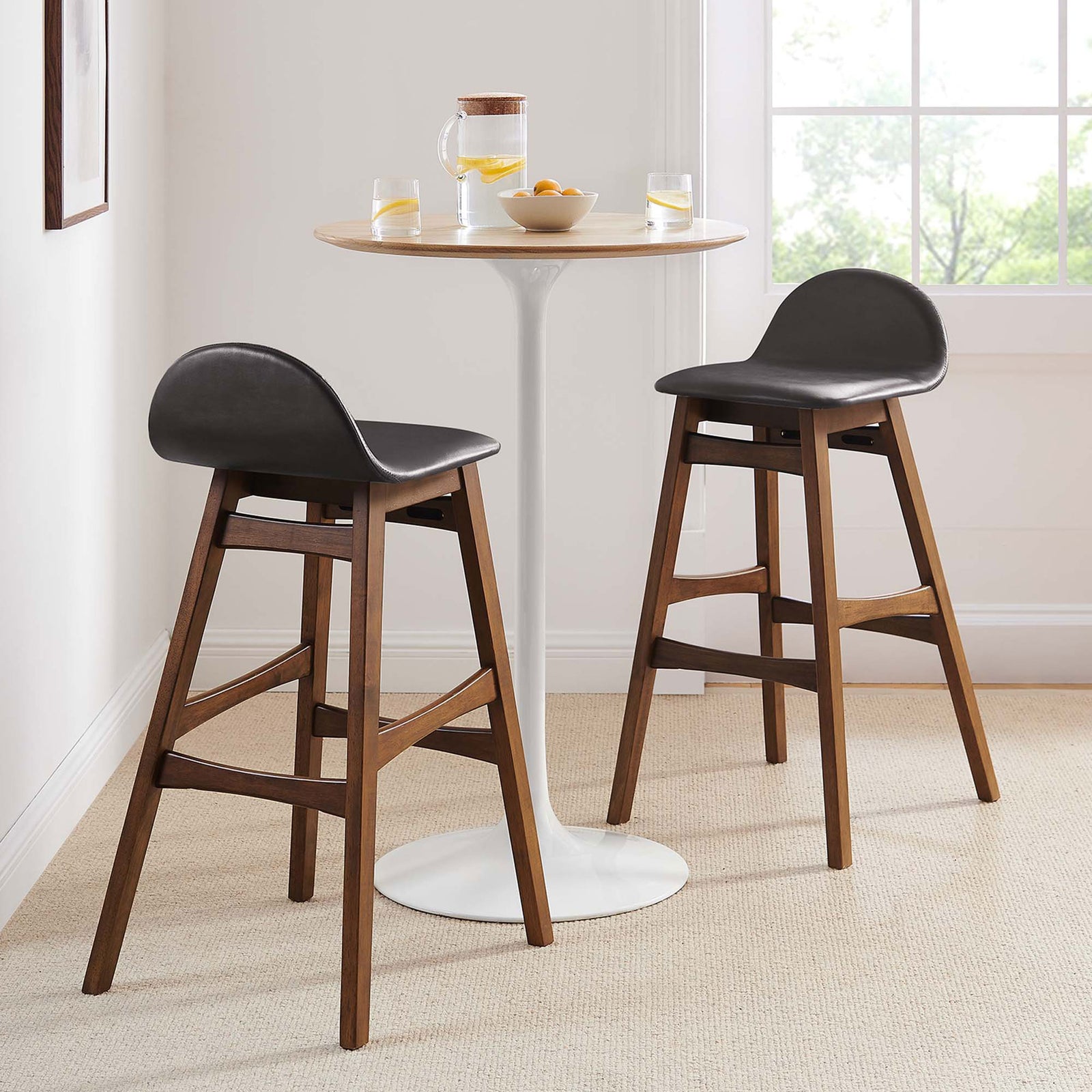 Two bar stools elevate a dining nook with warm wood tones and cushioned vegan leather seats || EEI-6554-BRN || front_angle_multi_room