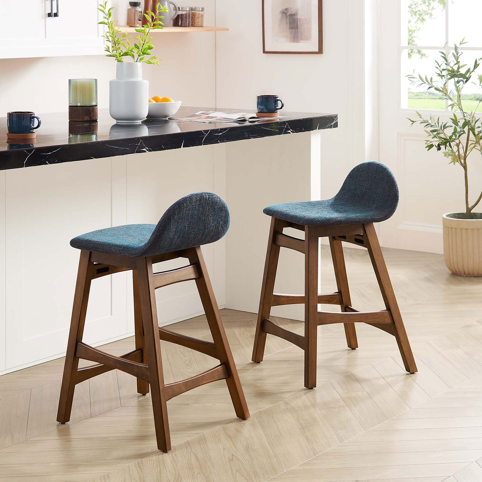Two stools complete a relaxed nook with warm wood tones and inviting, cushioned seats. || EEI-6555-HEA || front_angle_multi_room