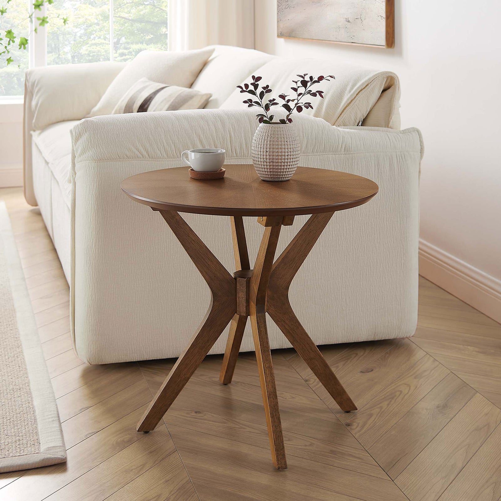 Crossroads walnut side table next to a sofa, perfect for drinks, books, and decorative accents || EEI-6558-WAL || front_angle_room