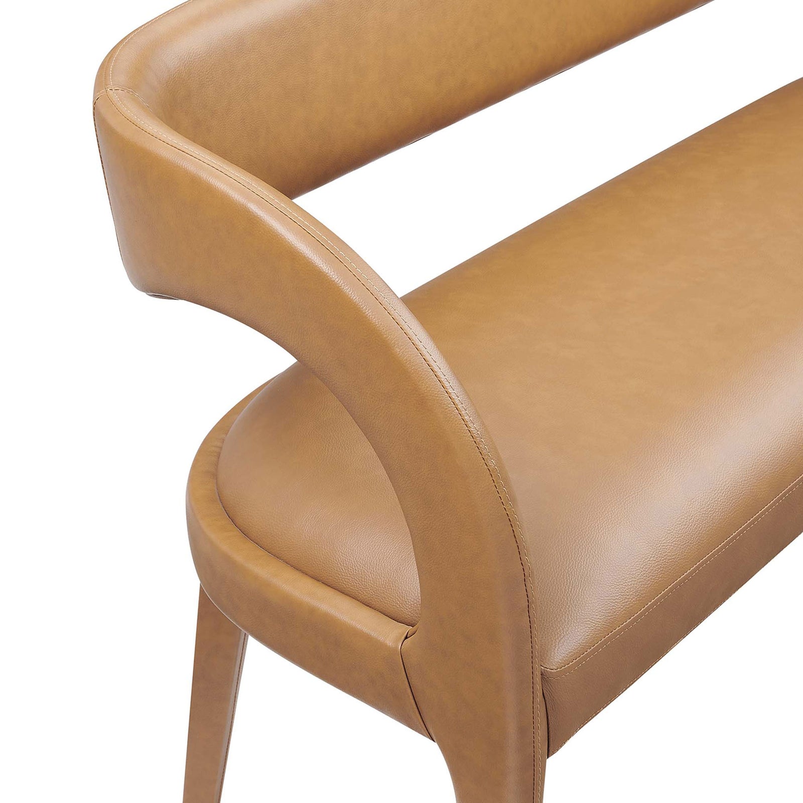 Tailored stitching and smooth vegan leather accentuate the curved arm and seat || EEI-6570-TAN || detail_studio