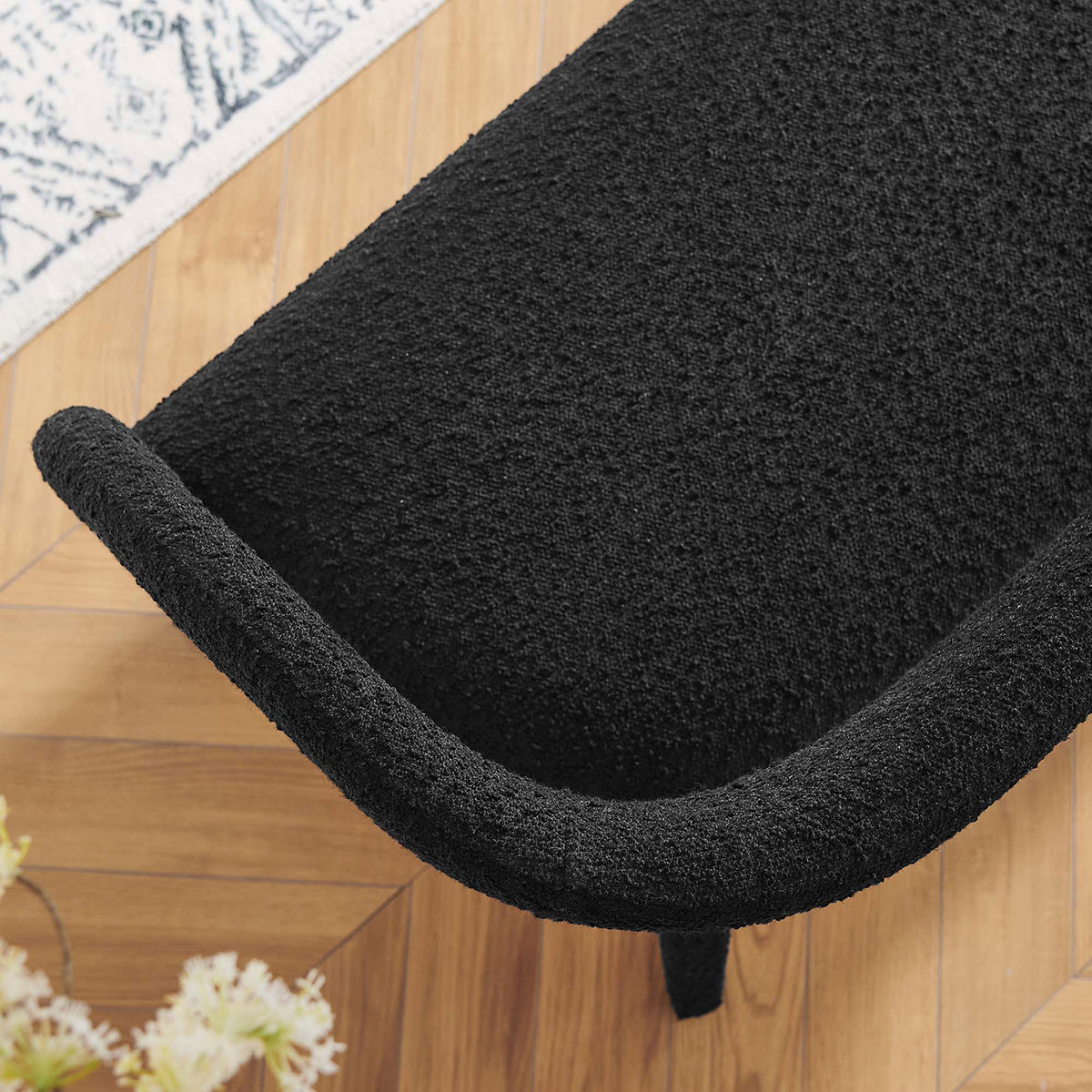 Nubby boucle texture and gently curved seat edge elevate everyday seating comfort || EEI-6571-BLK || detail_room