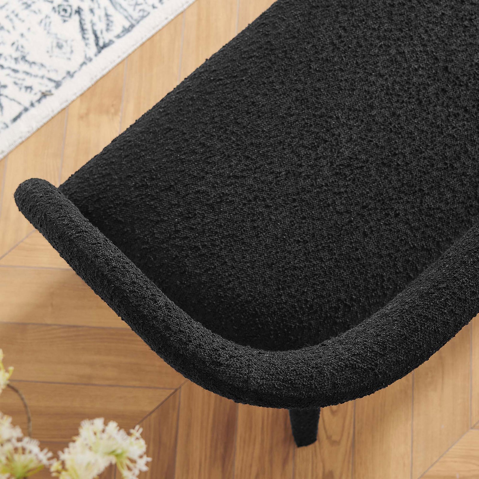 Nubby boucle texture and gently curved seat edge elevate everyday seating comfort || EEI-6571-BLK || detail_room