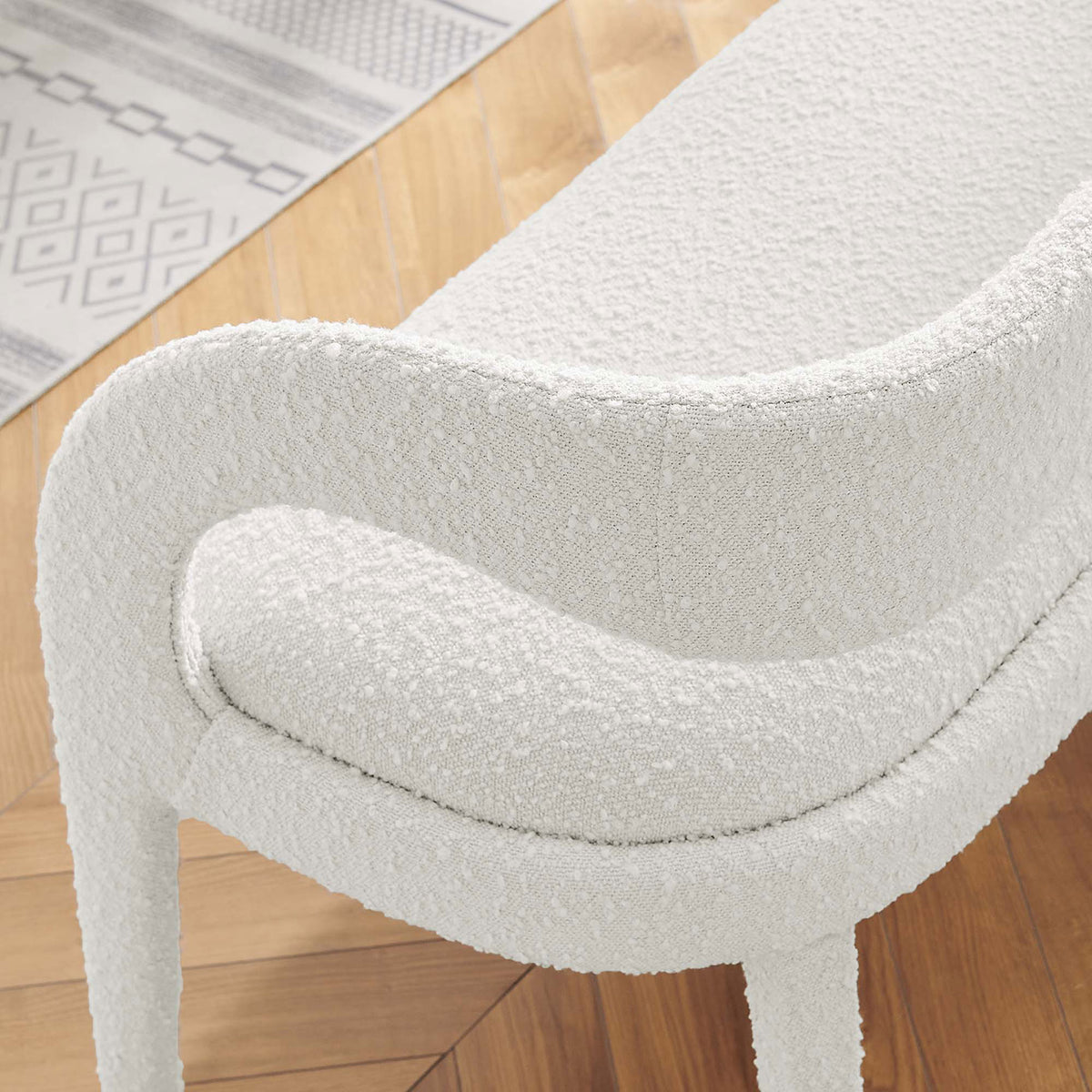 Curved back and arm detail in ivory boucle brings soft texture to modern interiors. || EEI-6571-IVO || detail_room