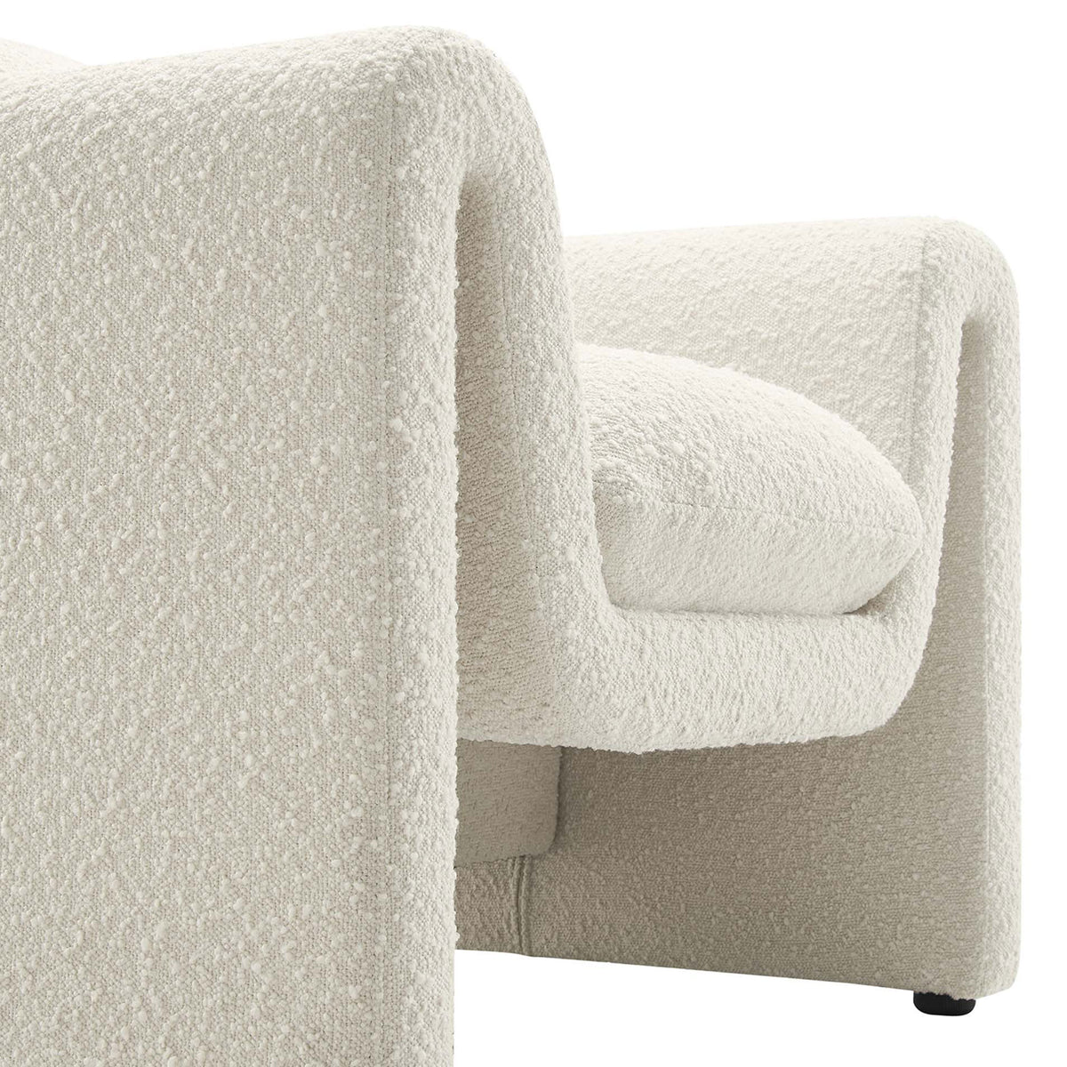 Textured boucle upholstery with dense foam cushioning for soft, sink-in comfort. || EEI-6575-IVO || detail_studio