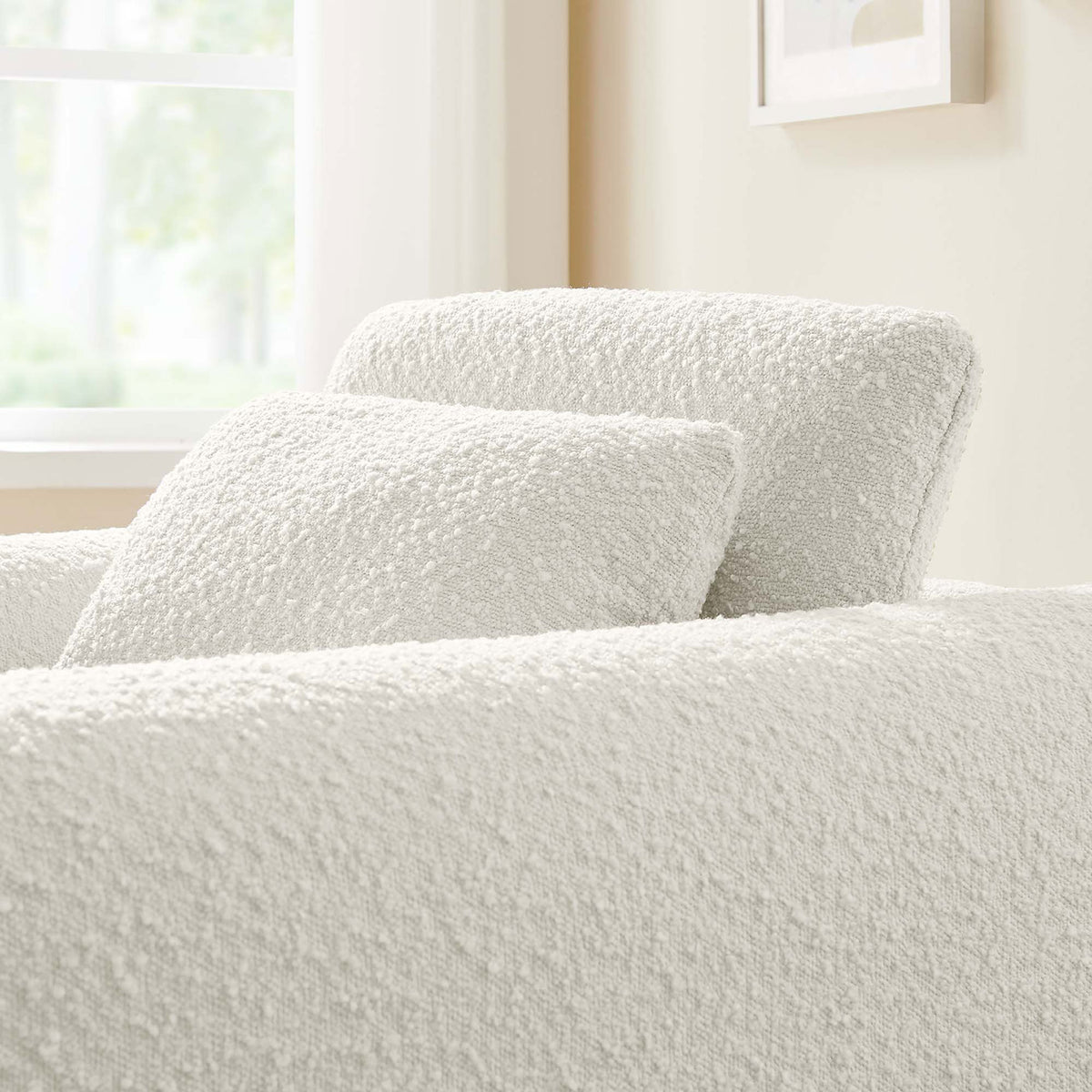 Cozy boucle texture and supportive back cushion bring warmth to any living space. || EEI-6575-IVO || detail_room