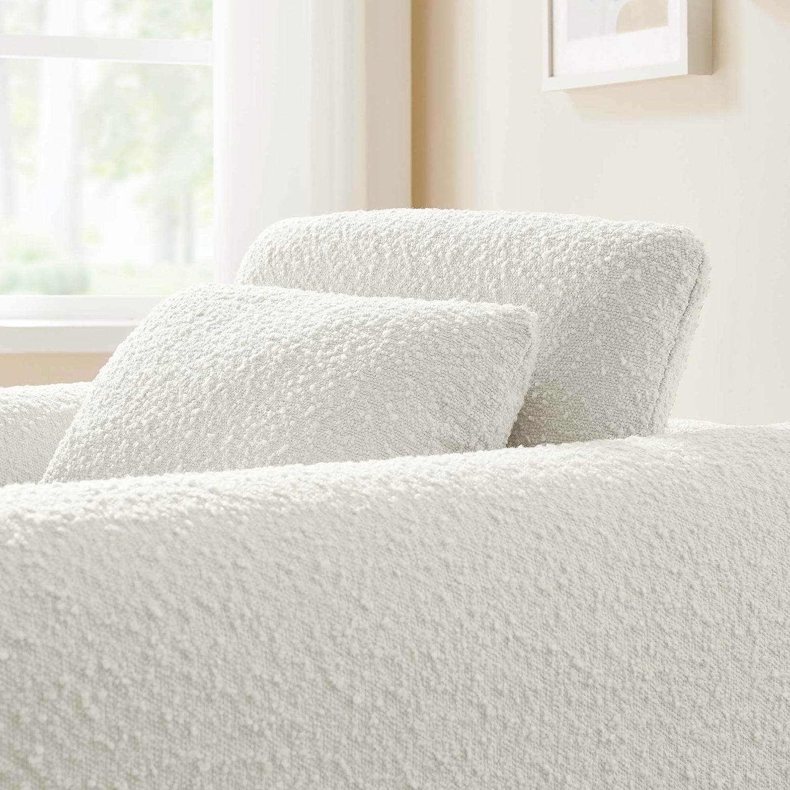Cozy boucle texture and supportive back cushion bring warmth to any living space. || EEI-6575-IVO || detail_room