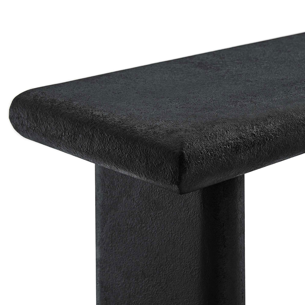 Rounded bullnose tabletop corner showcasing the richly textured concrete finish || EEI-6577-BLK || detail_studio