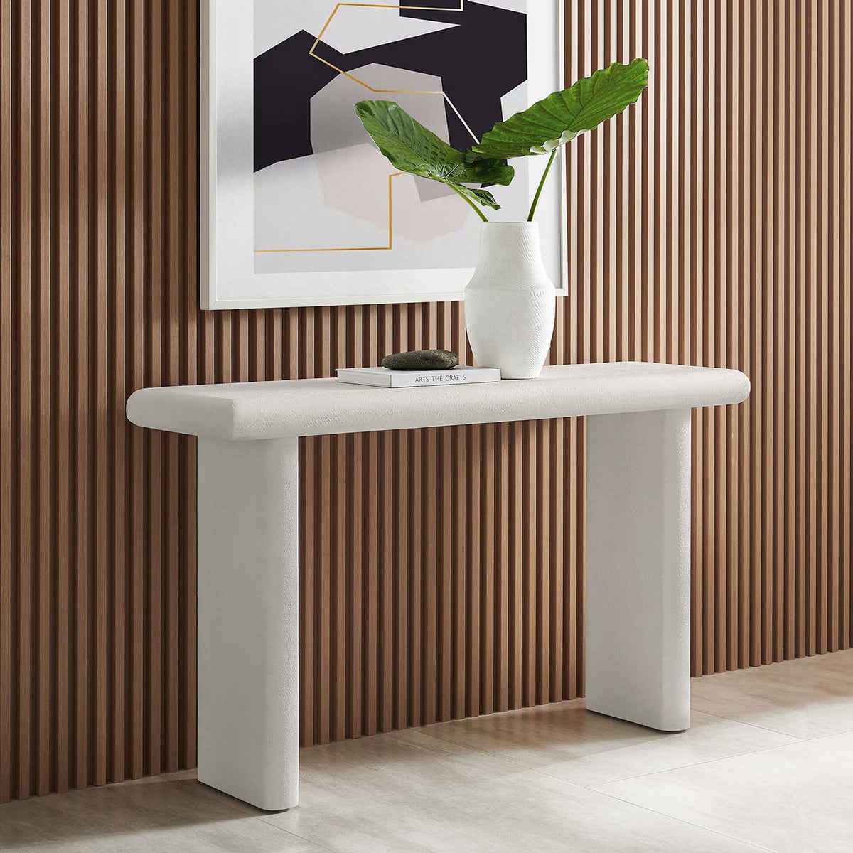 Modern white console table elevates an entryway with a smooth, concrete-textured silhouette || EEI-6577-WHI || front_angle_room