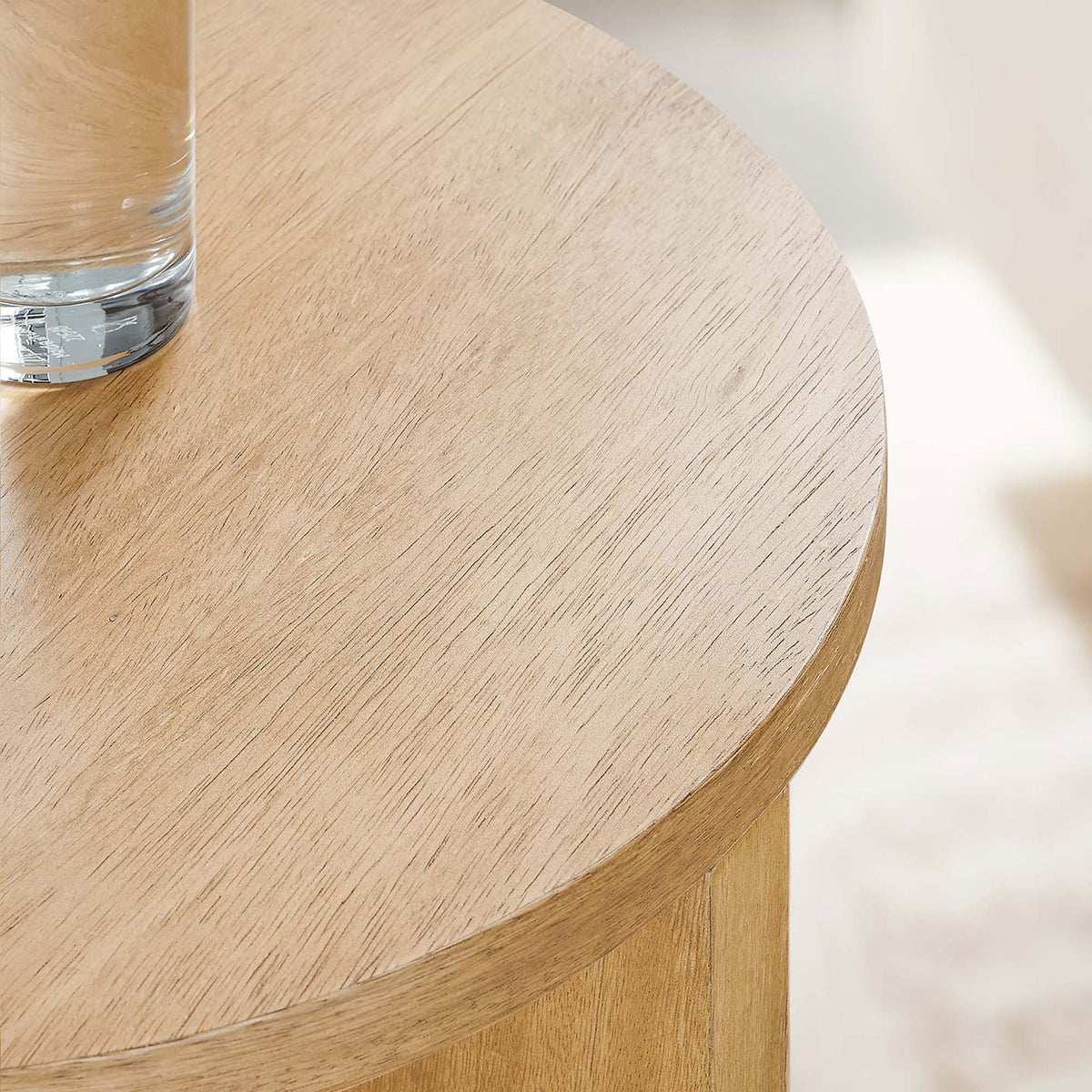 Round tabletop with visible wood grain and space for a drink or decor || EEI-6579-NAT || detail_room