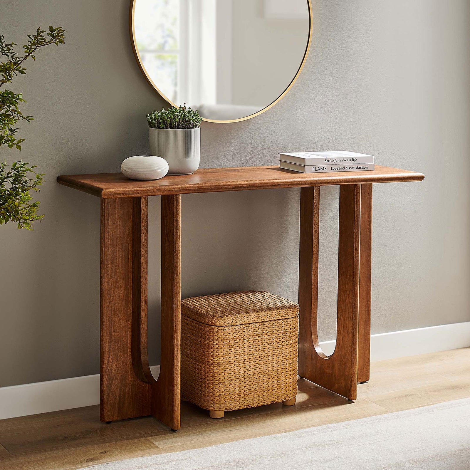Versatile console table elevates entryways and living rooms with a warm walnut finish and airy base || EEI-6596-WAL || front_angle_room