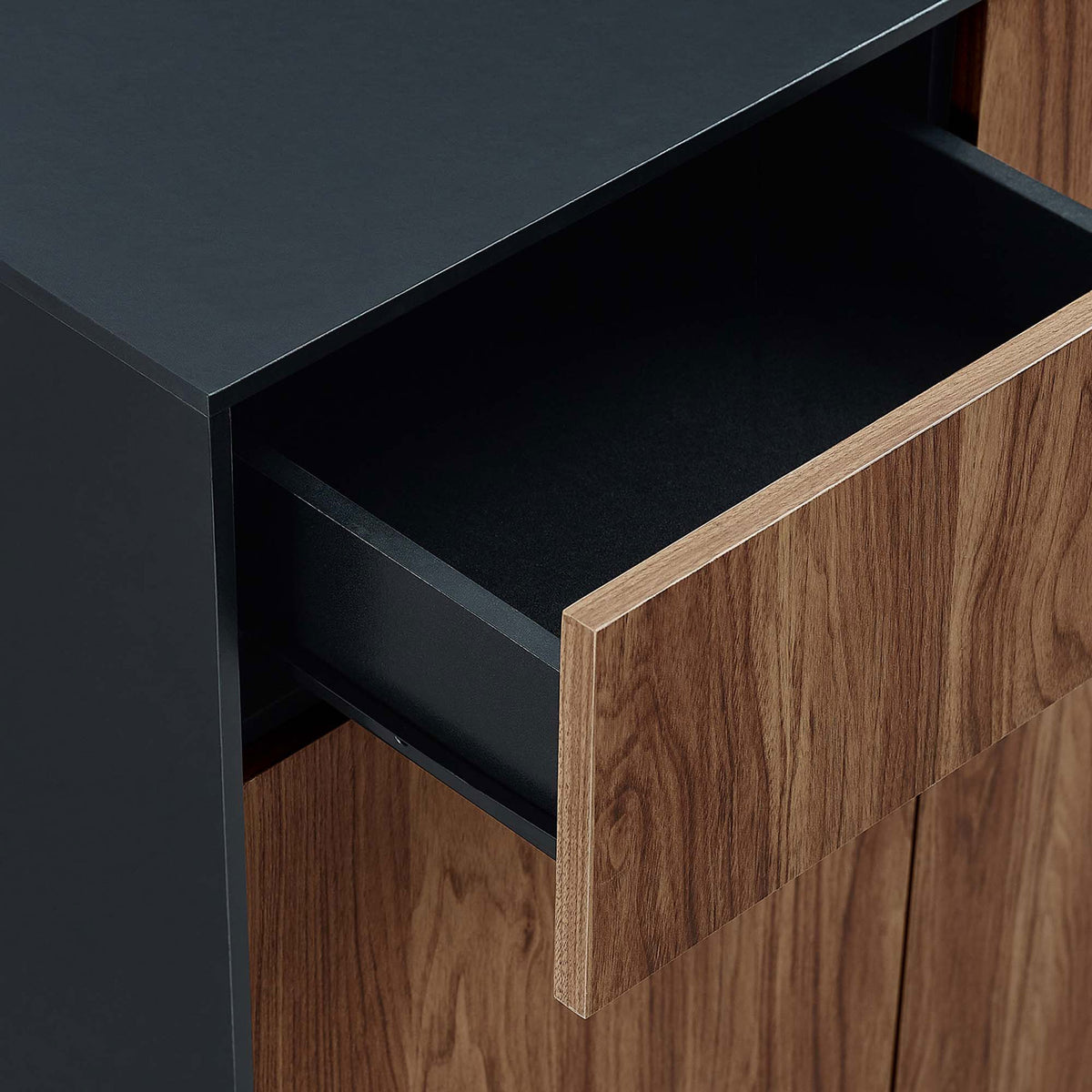 Open drawer of the Holden sideboard highlighting smooth wood grain front and spacious black interior || EEI-6597-BLK-WAL || storage_open_studio
