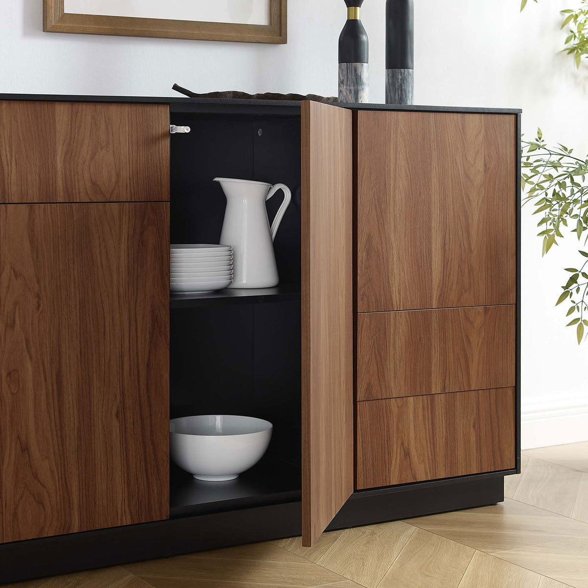 Black walnut sideboard cabinet door open to display dinnerware storage on adjustable interior shelf || EEI-6597-BLK-WAL || storage_open_room