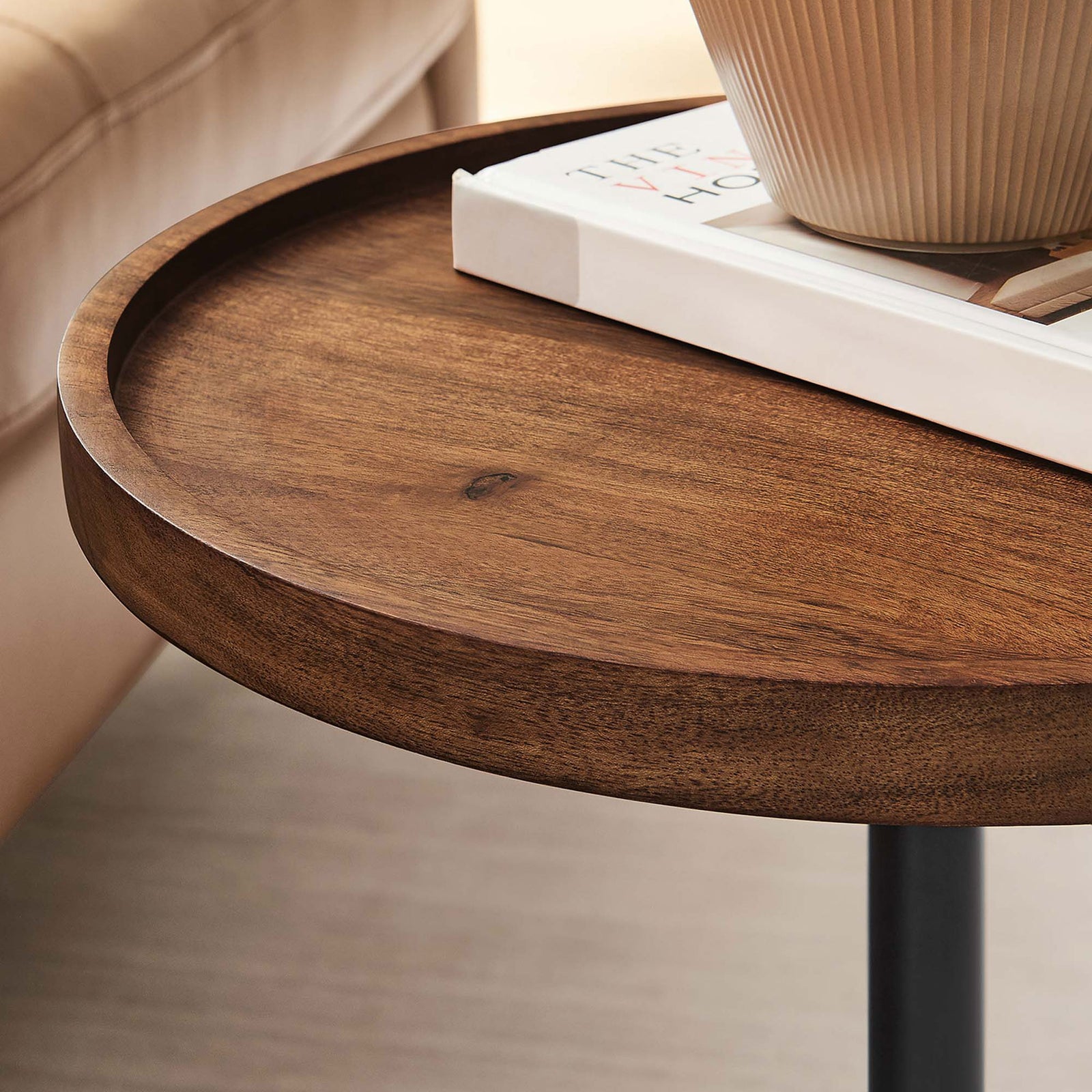 Styled tabletop scene with tray edge holding books and decor on the round acacia side table || EEI-6607-WHI-LOC || detail_room
