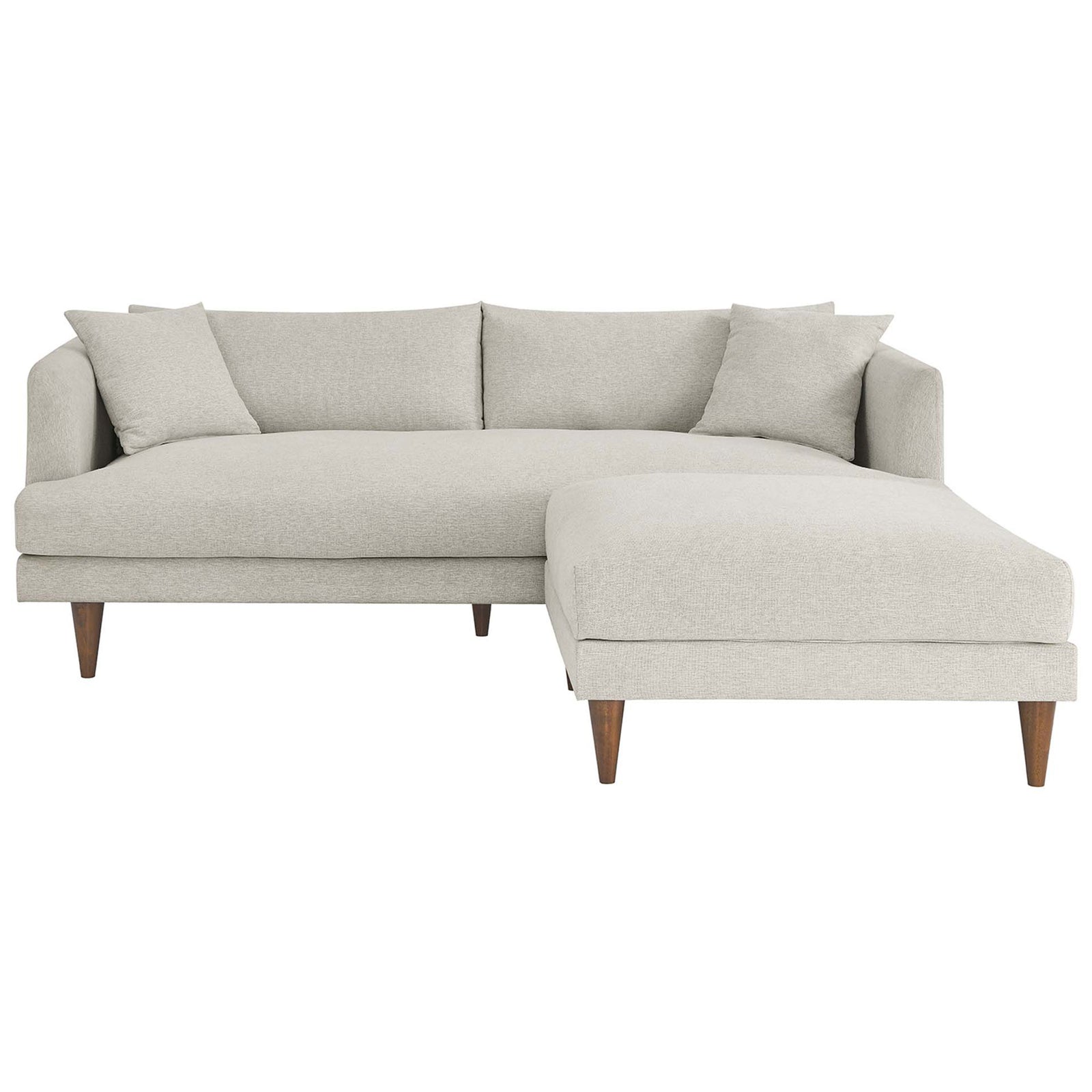 Spacious ivory sofa and ottoman forming a lounge-ready chaise with generous cushions and wood legs || EEI-6614-HEI || front_studio