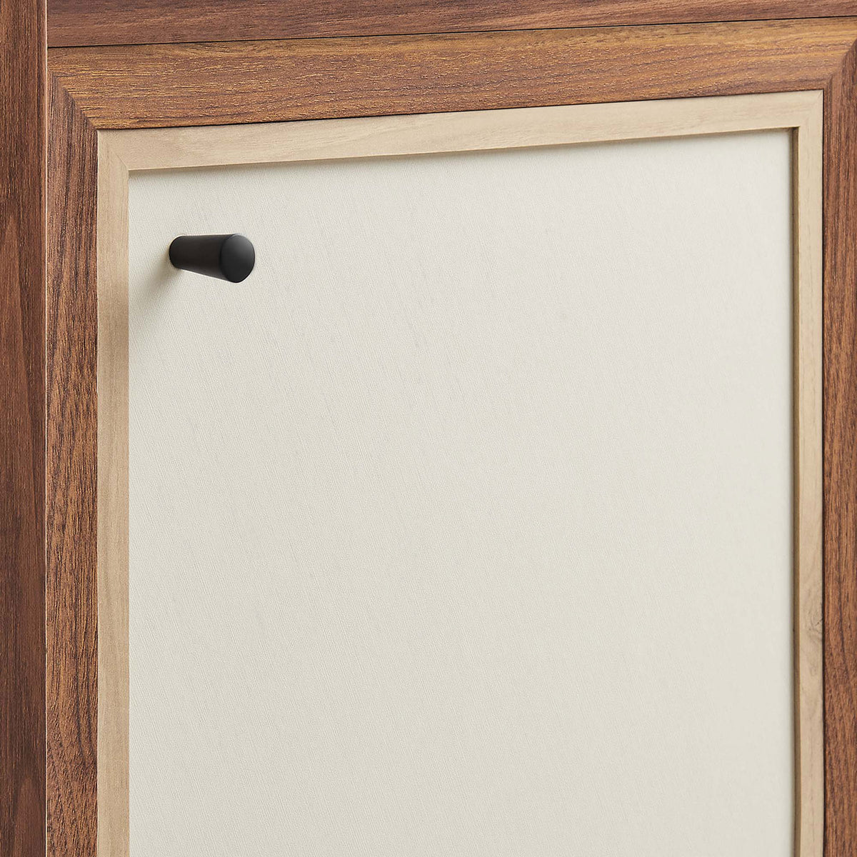 Linen-textured door panel with a minimalist black knob and warm walnut trim. || EEI-6617-WAL || handle_studio