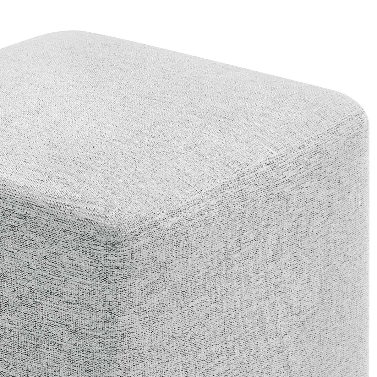 Heathered weave fabric on the ottoman corner, emphasizing its soft, textured finish || EEI-6636-HLG || detail_studio