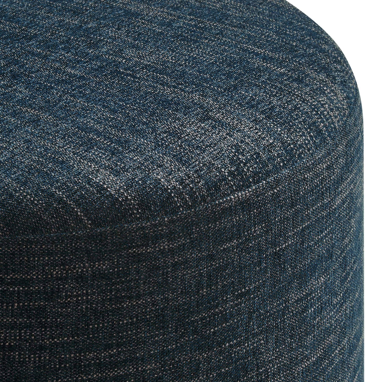 Heathered weave upholstery shows rich blue tones and subtle texture around the ottoman's curved edge || EEI-6645-HEA || detail_studio