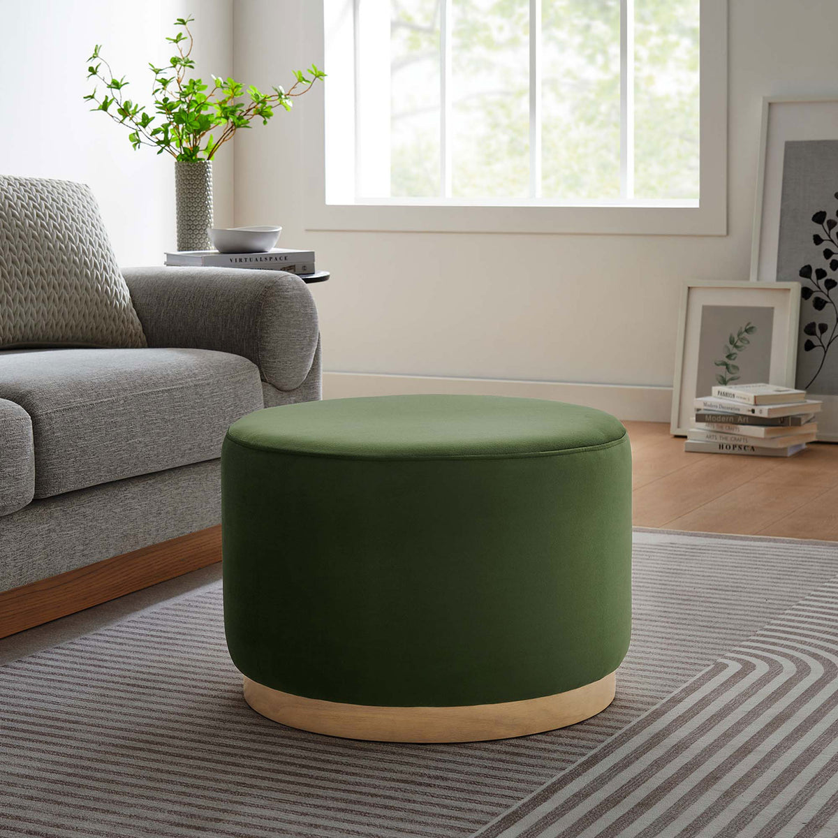 Moss green velvet ottoman brings soft color and extra seating to a cozy gray living room. || EEI-6646-MOG-NAT || front_angle_room
