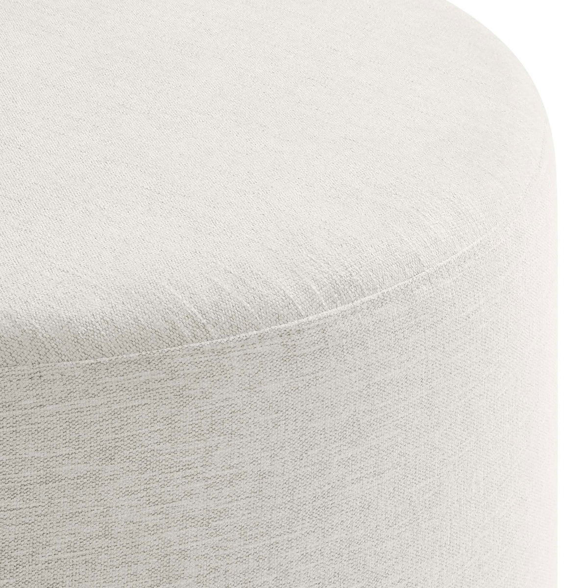 Heathered upholstery shows a finely woven texture and neatly tailored seams around the rounded edge. || EEI-6647-HEI || detail_studio