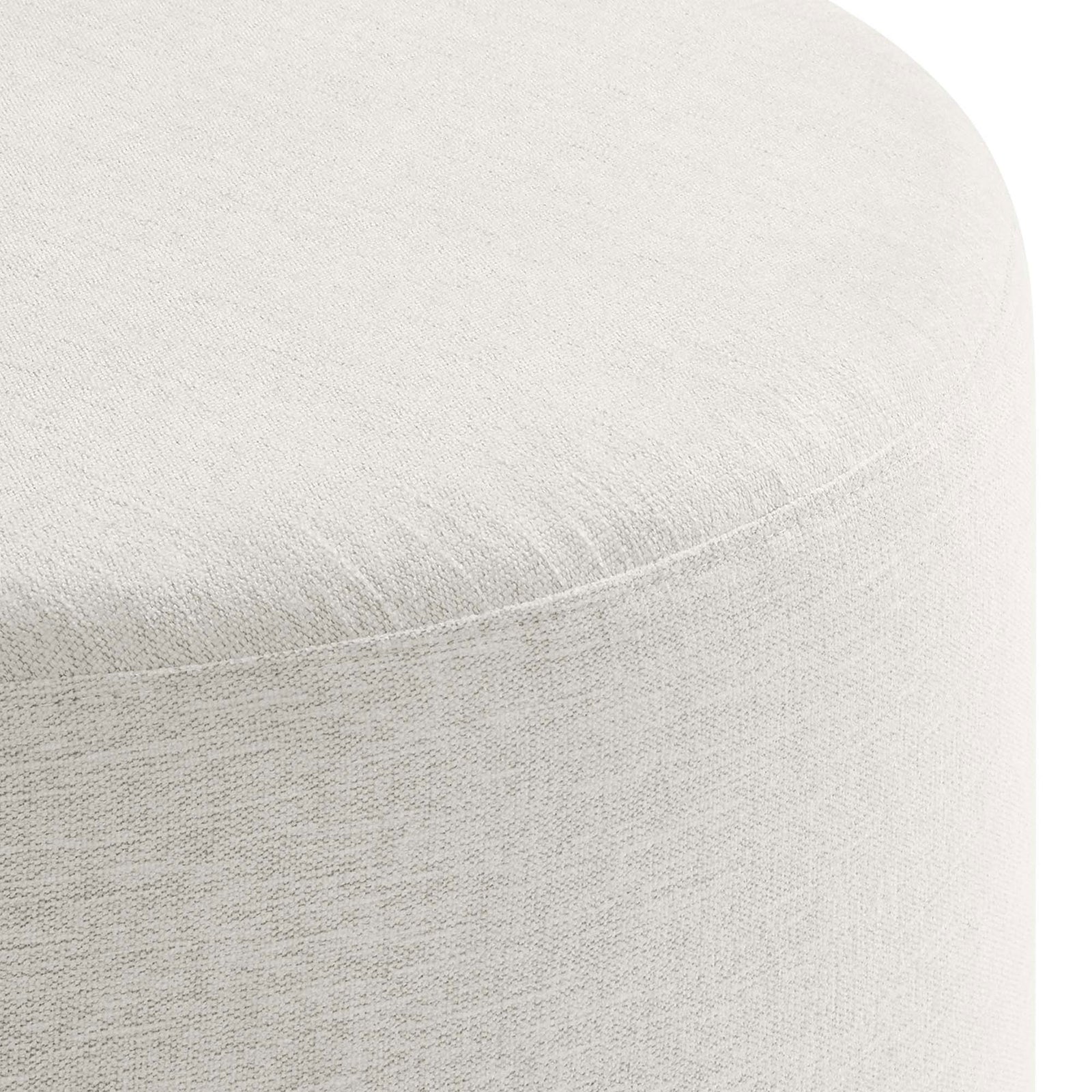 Heathered upholstery shows a finely woven texture and neatly tailored seams around the rounded edge. || EEI-6647-HEI || detail_studio
