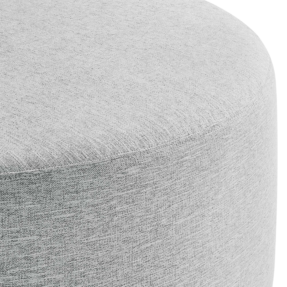 Woven heathered upholstery and clean seam lines on the light gray 38 inch round ottoman || EEI-6649-HLG || detail_studio