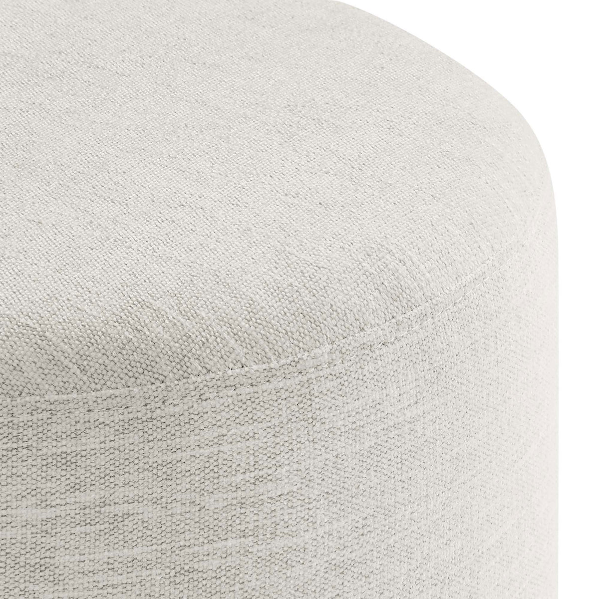 Close view of the woven heathered ivory fabric showcases the ottoman's soft texture and tailored seams. || EEI-6651-HEI || detail_studio