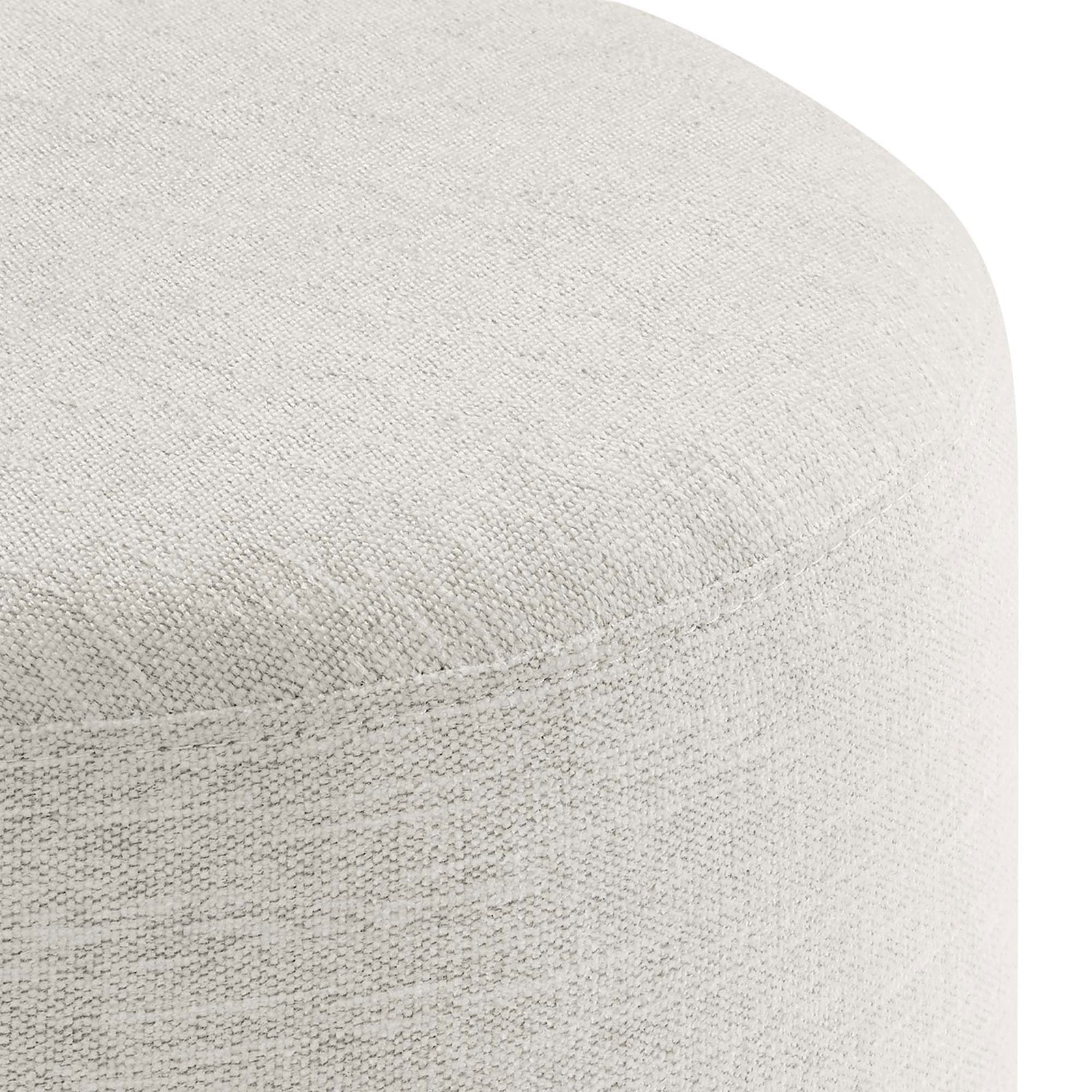 Close view of the woven heathered ivory fabric showcases the ottoman's soft texture and tailored seams. || EEI-6651-HEI || detail_studio