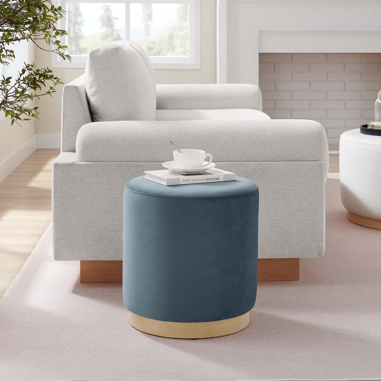 Cadet blue ottoman as a side table in a bright modern living room || EEI-6652-CAB-NAT || front_angle_room