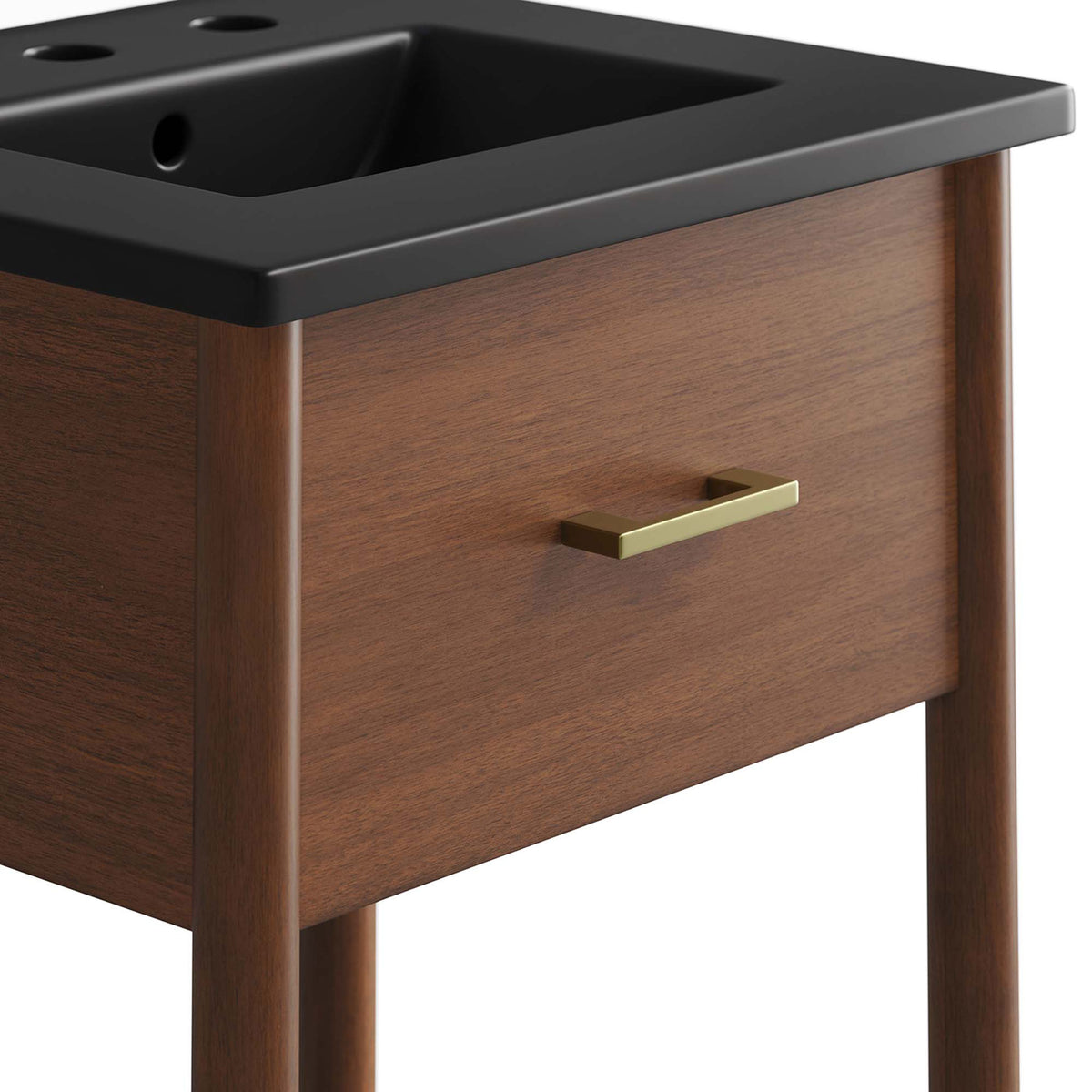 Brushed brass pull adds a refined accent to the walnut drawer front beneath the basin. || EEI-6659-WAL-BLK || handle_studio
