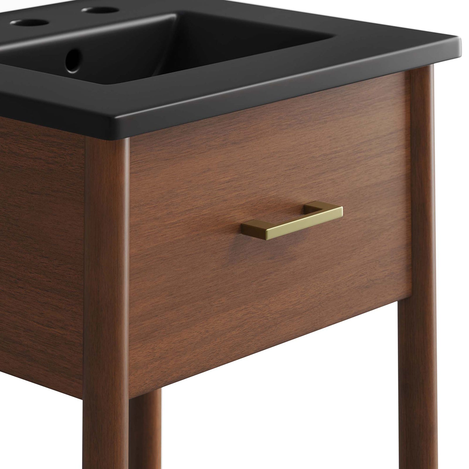Brushed brass pull adds a refined accent to the walnut drawer front beneath the basin. || EEI-6659-WAL-BLK || handle_studio