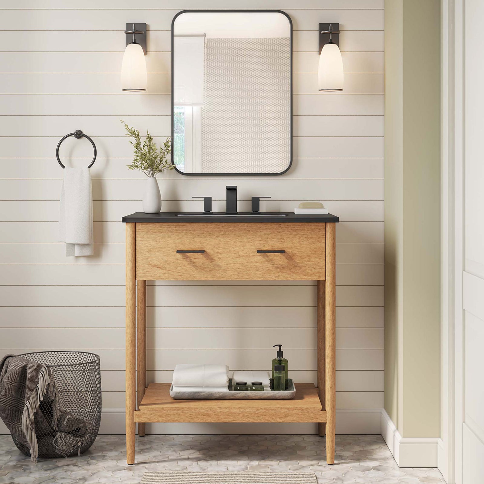Natural wood vanity with black sink and open shelf creates a clean, inviting bathroom focal point || EEI-6663-NAT-BLK || front_room