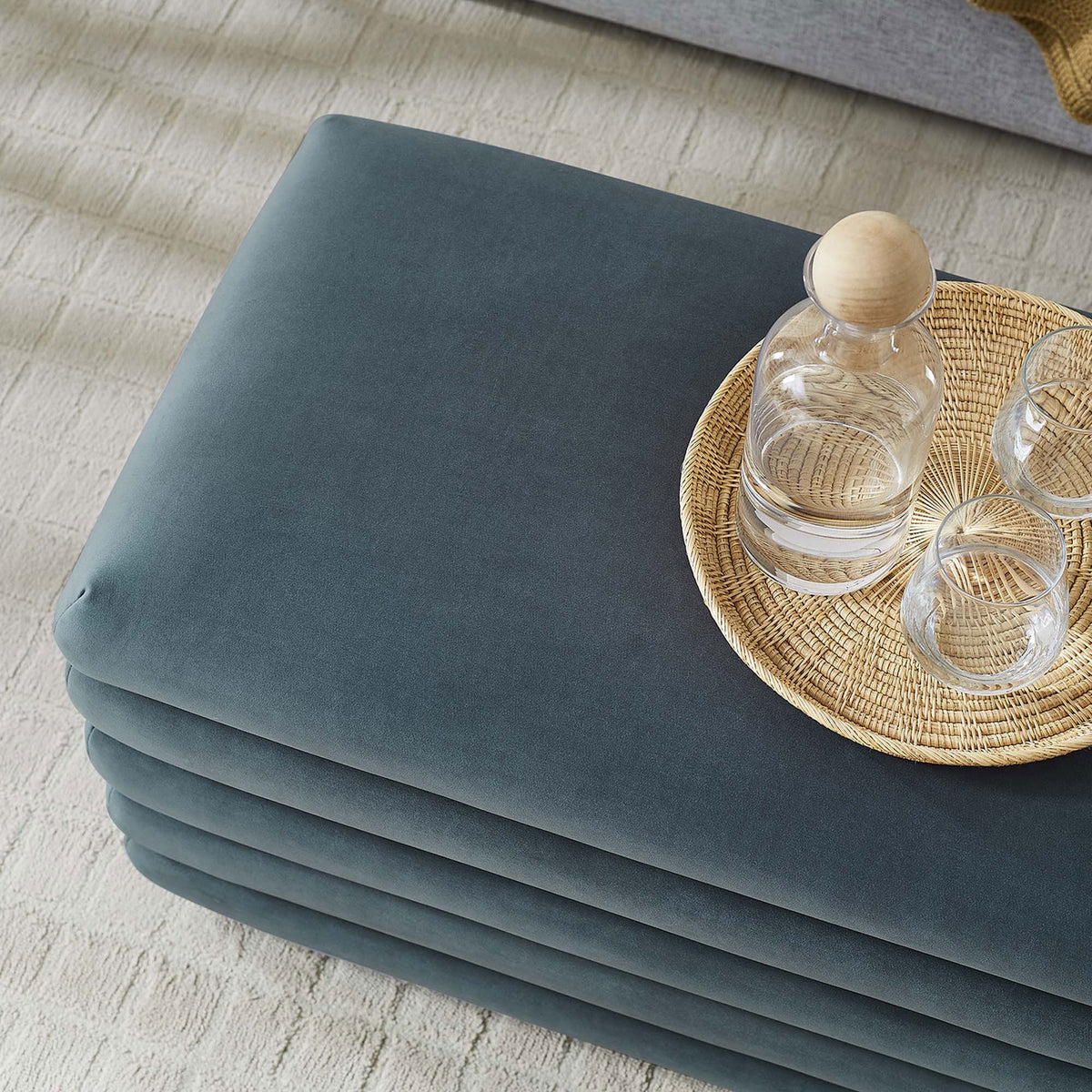 Soft, smooth top offers a comfortable perch and a handy surface for a tray or decor. || EEI-6664-CAB || detail_room
