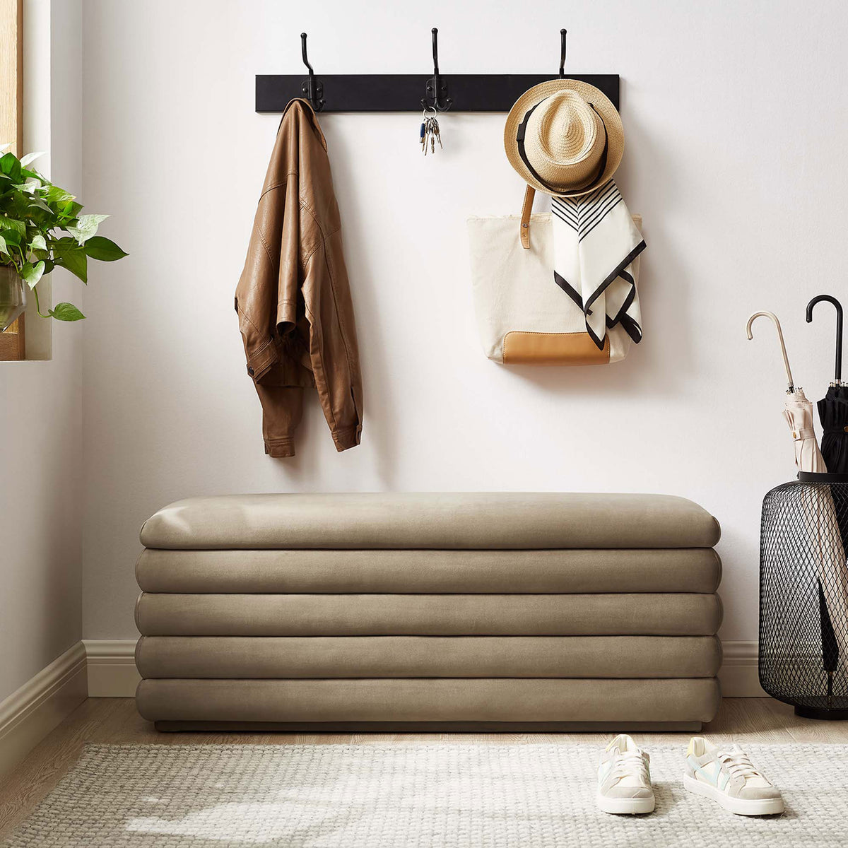 Versatile taupe velvet bench adds cushioned seating to an entryway with clean, ribbed lines. || EEI-6664-TAU || front_room