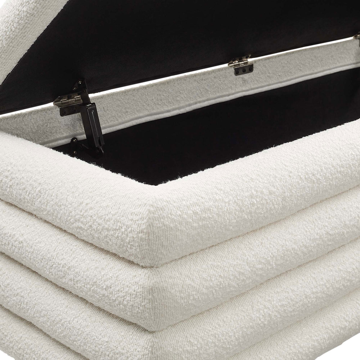 Stay-open metal hinges and neatly upholstered storage rim in boucle || EEI-6665-CLO || detail_studio