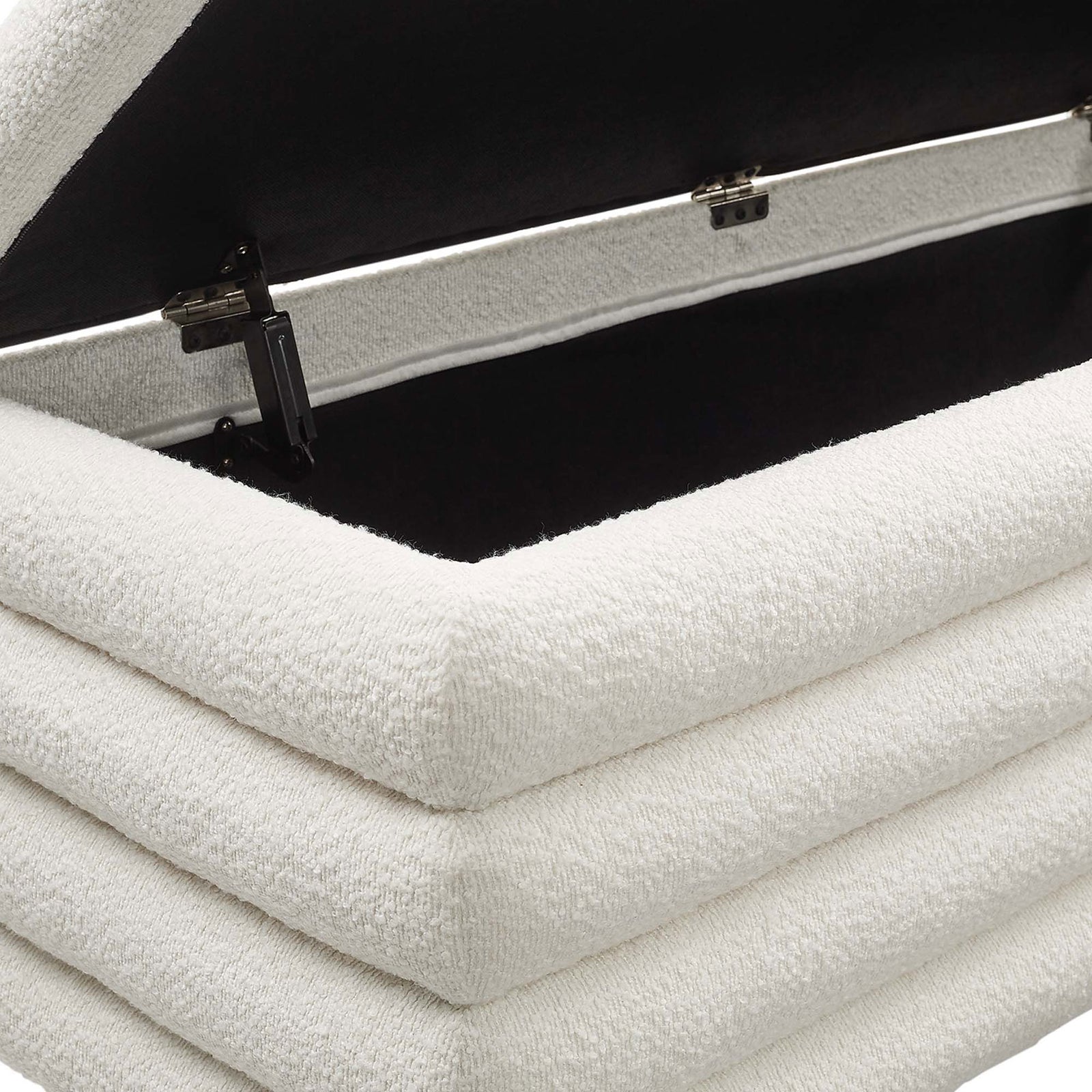 Stay-open metal hinges and neatly upholstered storage rim in boucle || EEI-6665-CLO || detail_studio