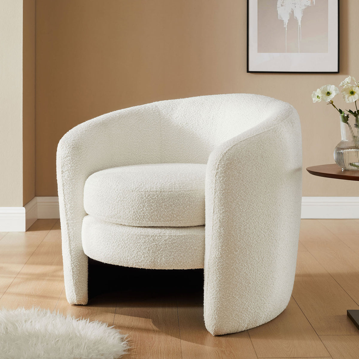 Elevates any room with its cloud boucle upholstery and graceful, embracing form || EEI-6666-CLO || front_angle_room
