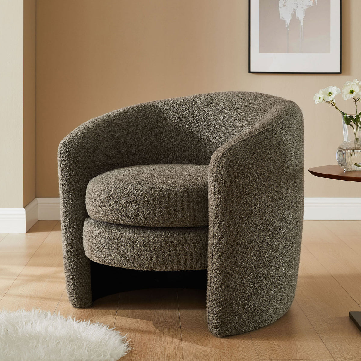 Pebble boucle barrel chair adds soft texture and sculptural curves to the living room || EEI-6666-PEB || front_room
