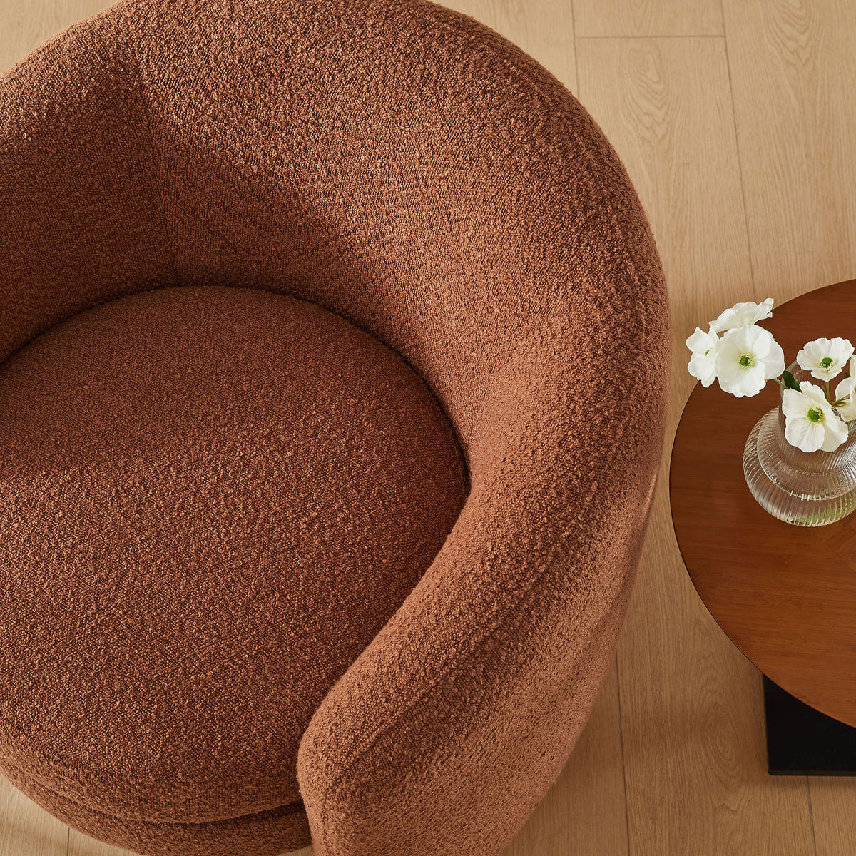 Rust boucle seat lends cozy texture to a modern corner with warm wood accents || EEI-6666-RUS || top_room