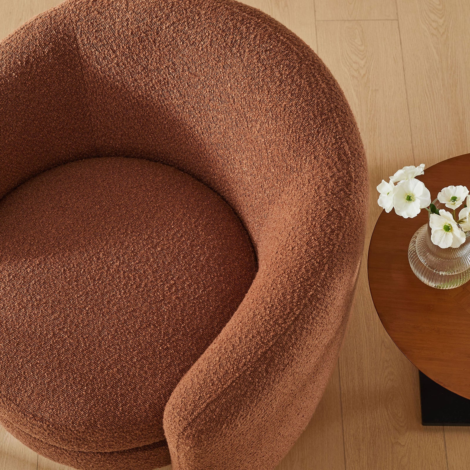 Rust boucle seat lends cozy texture to a modern corner with warm wood accents || EEI-6666-RUS || top_room