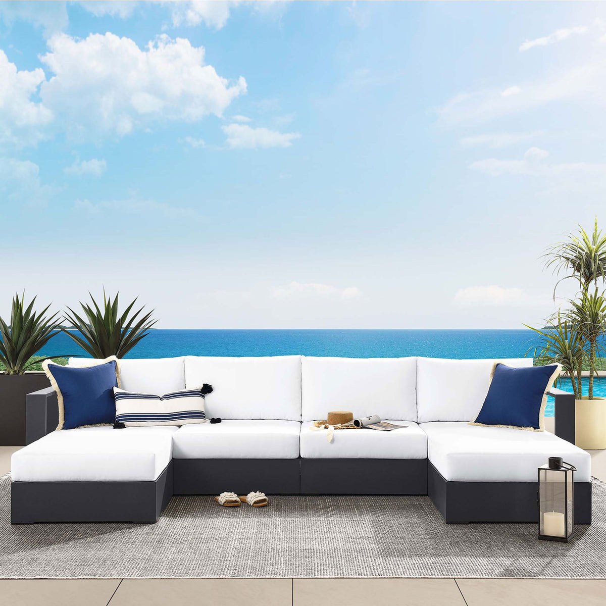 Tahoe outdoor sectional with white cushions styled for breezy coastal lounging on a sunny poolside terrace || EEI-6676-GRY-WHI || front_angle_room