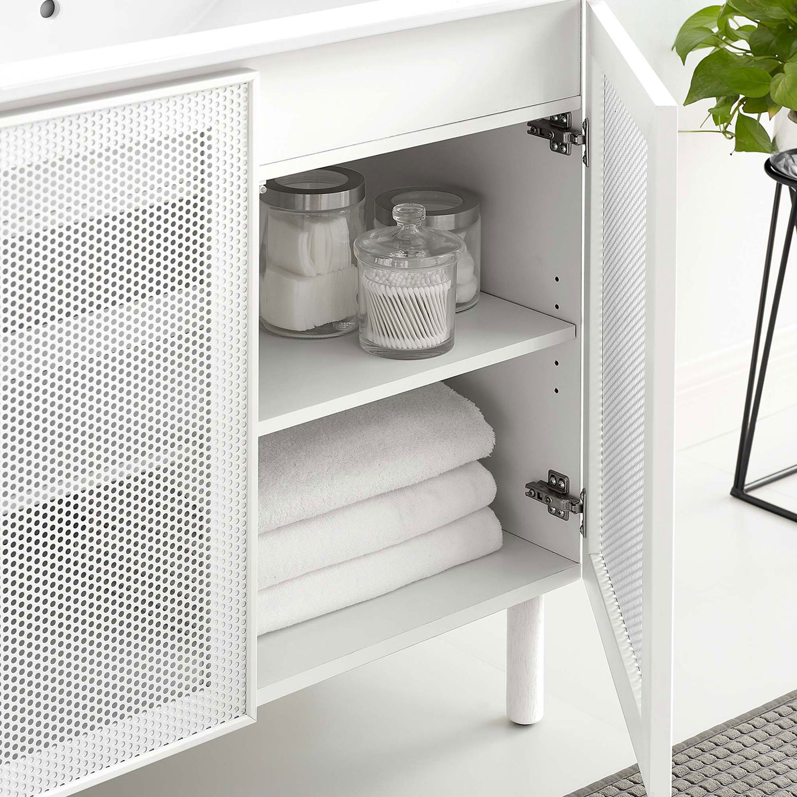 Doors open to reveal a spacious, adjustable shelf for organized bathroom storage || EEI-6678-WHI-WHI || front_angle_open_room