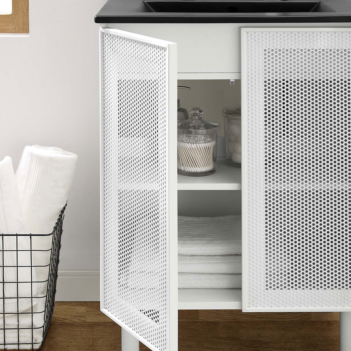 Perforated doors swing open to reveal adjustable storage for towels and essentials || EEI-6679-BLK-WHI || front_open_room
