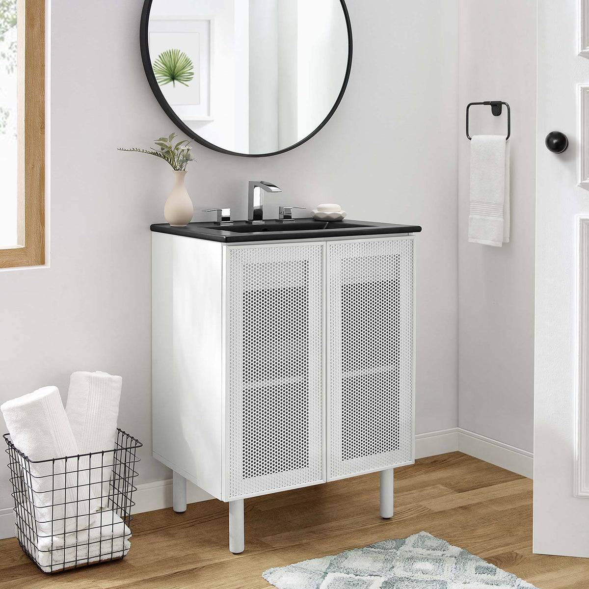 Modern 24-inch vanity completes a bright bath with sleek contrast and clean lines || EEI-6679-BLK-WHI || front_room