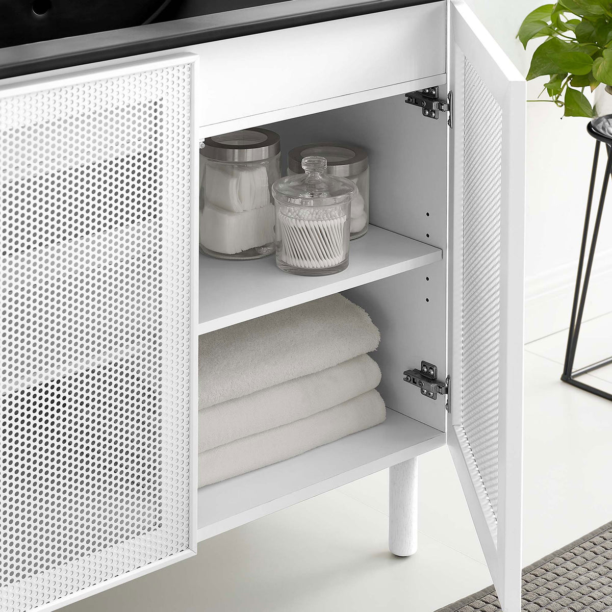 Doors open to reveal roomy shelving for towels and jars || EEI-6680-BLK-WHI || front_open_room