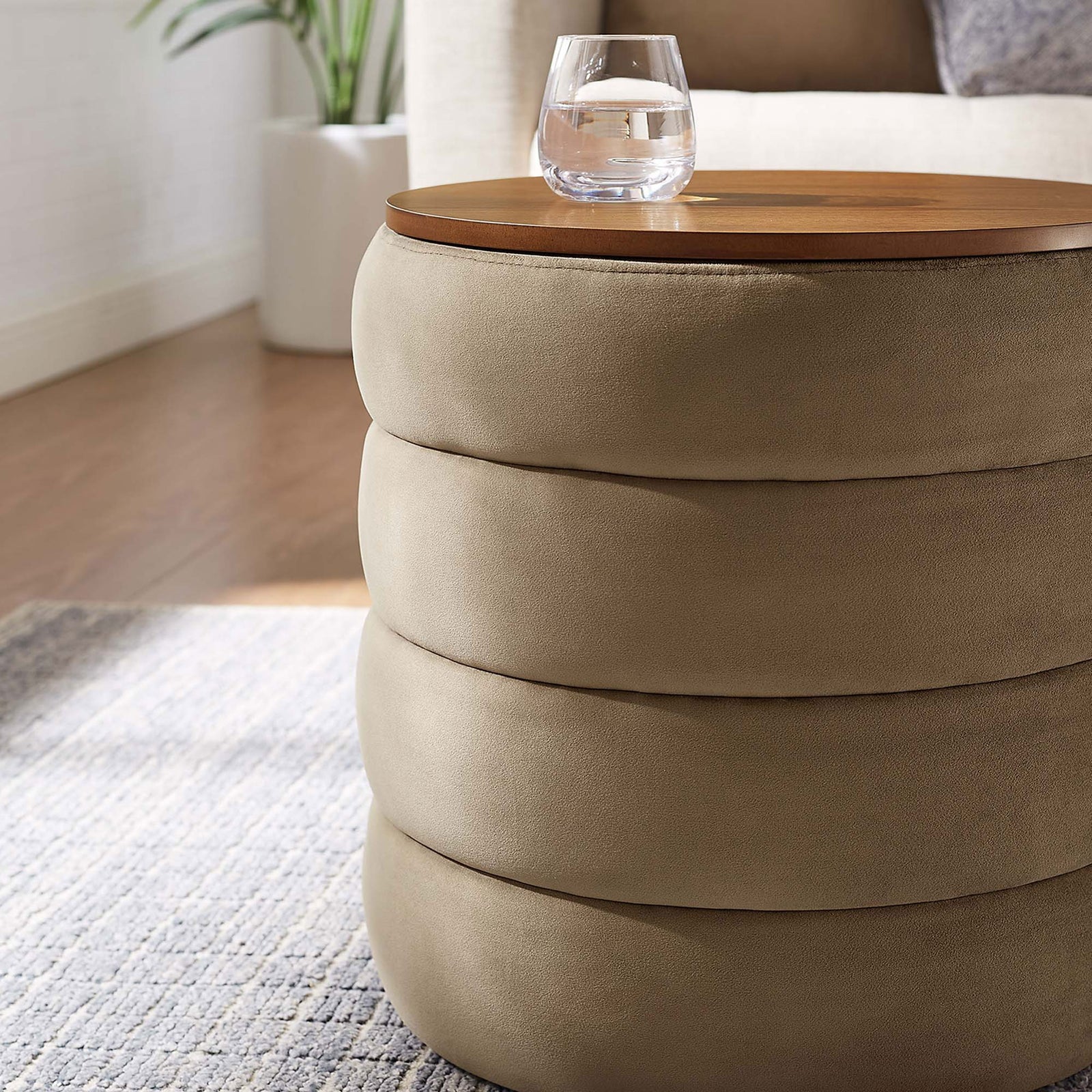 Taupe velvet storage ottoman with wood top used as side table beside a modern sofa || EEI-6684-TAU || detail_room
