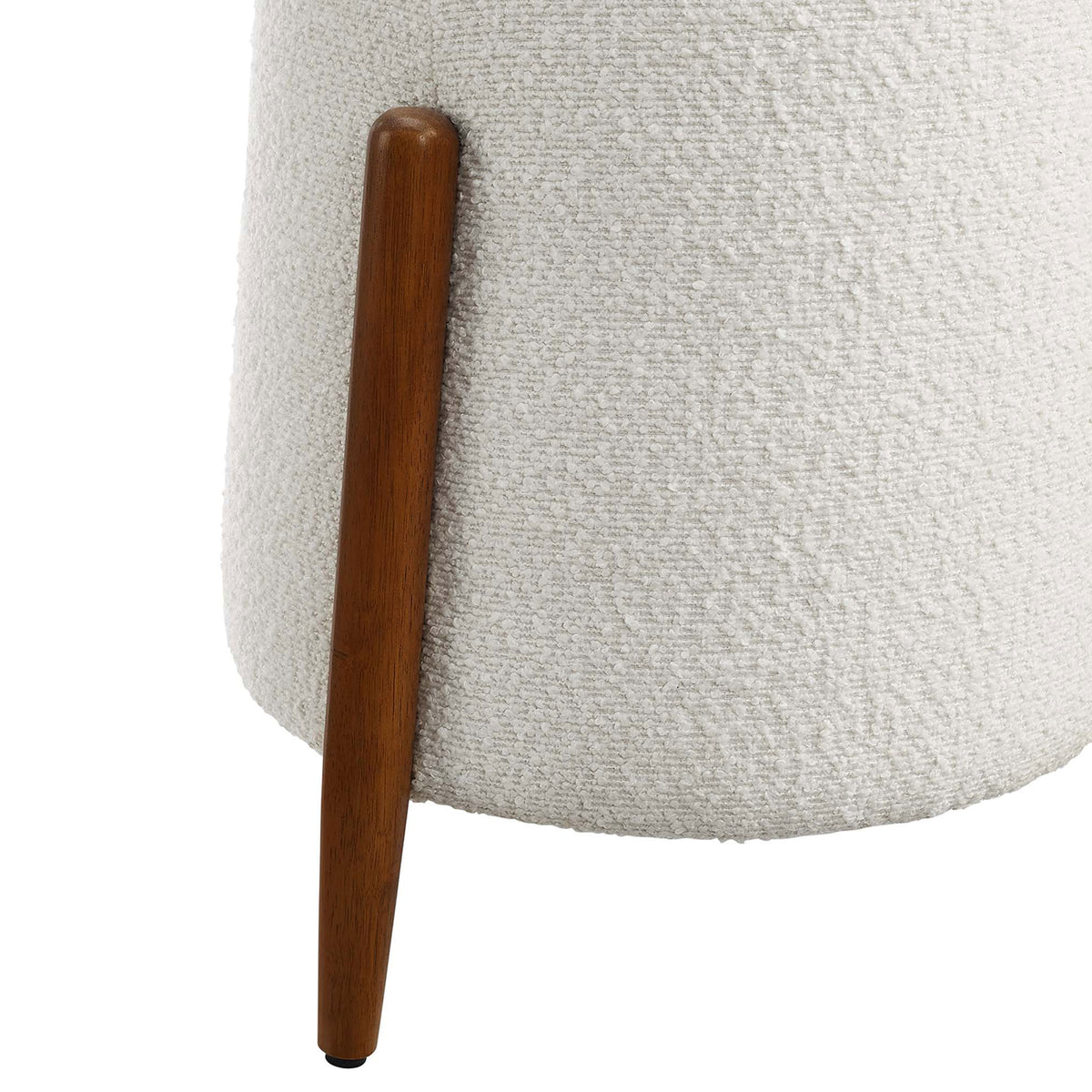 Close up of tapered wood leg contrasted against soft cloud boucle upholstery || EEI-6686-CLO || leg_studio