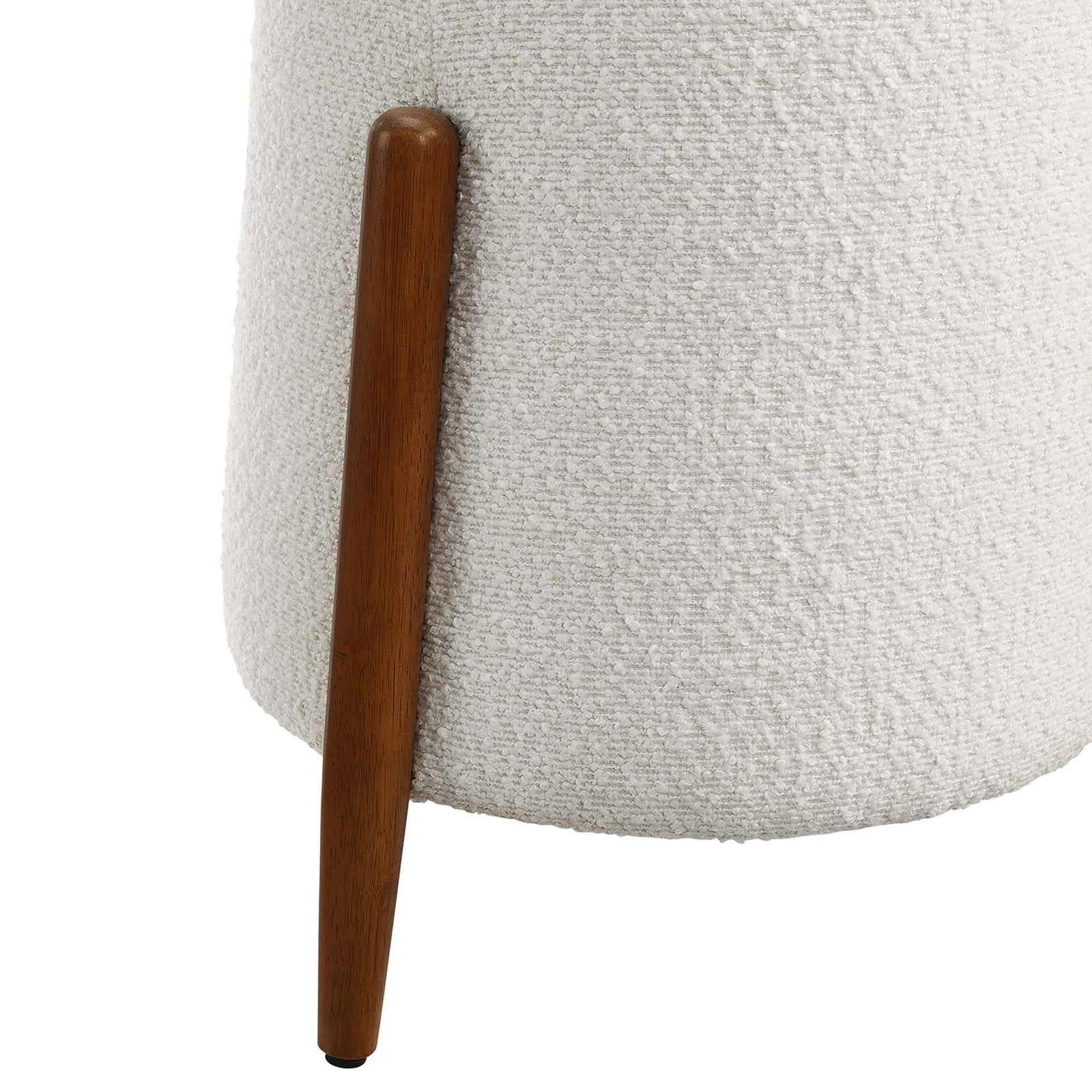 Close up of tapered wood leg contrasted against soft cloud boucle upholstery || EEI-6686-CLO || leg_studio