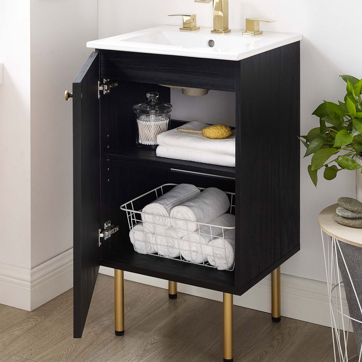 Cabinet door opens to reveal adjustable storage, bringing airy texture to a modern bath || EEI-6691-BLK-WHI || front_angle_open_room
